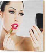 Beautiful Woman Applying Pink Lipstick On Lips Wood Print