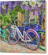 Bicycles At The Bakery Courtyard Wood Print