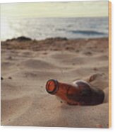 Bottle On Beach Wood Print
