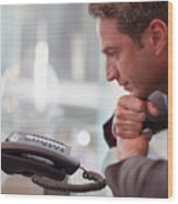 Businessman Staring At Telephone Waiting For It To Ring Wood Print