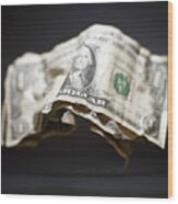 Close-up Of Crumpled Old American One Dollar Bills Levitating Against Black Background Wood Print
