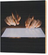 Close Up Of Human Hands Typing On Digital Tablet Against Black Background Wood Print
