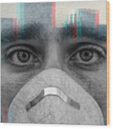 Double exposure portrait of face of young man wearing face mask against virus epidemic and a New York City skyline Wood Print