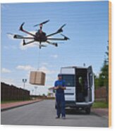 Drone Delivery Of Goods Wood Print