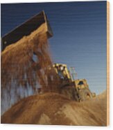 Earth Mover In Quarry Dumping Sand, Low Angle View Wood Print