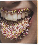 Female' Tongue And Lips Covered In Sugar Sprinkles Wood Print