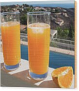 Fresh Orange Juice, Sun And View Of The Mediterranean Sea Wood Print