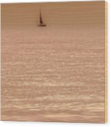 Ghost Boat Over Shimmering Sea Wood Print