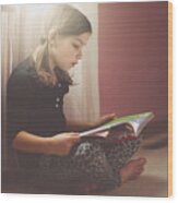 Girl Reading In Her Bedroom Wood Print