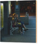 Girls On Bench In Station At Summer Night Wood Print