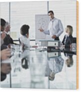 Group Of Office Workers In A Boardroom Presentation Wood Print