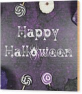 Halloween Trick Or Treat Flatlay On Purple Background With White Wood Print