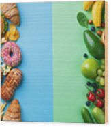 Healthy And Unhealthy Food Background From Fruits And Vegetables Vs Fast Food, Sweets And Pastry Top View. Diet And Detox Against Calorie And Overweight Lifestyle Concept. Wood Print