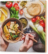 Healthy Vegetarian Food Background. Vegetables, Pesto And Lentil Curry With Tofu. Wood Print