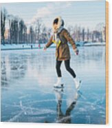 Ice Skating On The Frozen Lake Wood Print