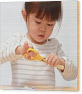 Japanese Girl Cutting Paper With Scissors (3 Years Old) Wood Print