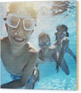Kids Playing Underwater In Pool Wood Print