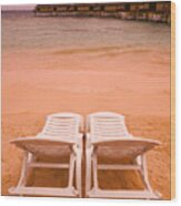 Landscape Photograph Of Two Empty Beach Chairs Overlooking A Beautiful Beach And Resort Wood Print