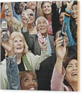 Large Crowd Of People Holding Their Mobile Phones In The Air Wood Print