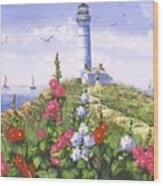 Lighthouse And Hollyhocks Wood Print