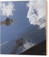 Low Angle View Of Fernsehturm Against Modern Building Wood Print