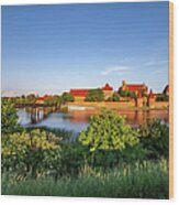 Malbork Castle River View At Sunset In Poland Wood Print