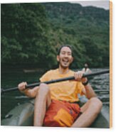 Man Paddling Kayak In Mangrove River And Laughing, Iriomote, Japan Wood Print