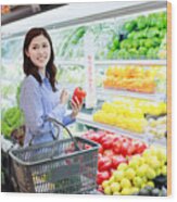 Mid Adult Woman Buying Grocery In Supermarket Wood Print