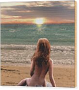Nude Woman Sitting On Beach Looking At Sunset Wood Print