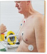 Nurse Placing Holter Monitor On Patient's Chest Wood Print