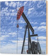 Oil Pumpjack With Clouds In Background Wood Print