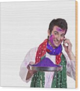 Portrait Of A Man With Holi Colour Talking On A Mobile Phone Wood Print