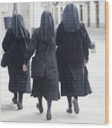 Rear View Of Three Nuns Walking In The Street. Wood Print
