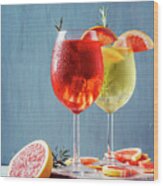 Red And White Aperol Spritz Garnish In Wine Glasses Wood Print