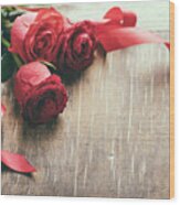 Red Roses With Red Ribbon On Wooden Table Wood Print