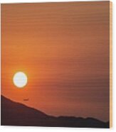 Red Sunset And Plane In Flight Wood Print