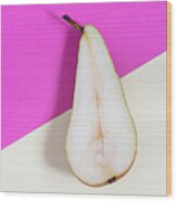 Slice Of Healthy Pear Fruit On A Colourful Background. Wood Print