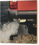 Smoke Coming From Exhaust Pipe Of A Car Wood Print