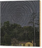 Star Trails Over Stone House Wood Print