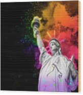 Statue Of Liberty With Colorful Rainbow Holi Paint Powder Explosion Isolated On Black Background Wood Print