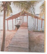 Swaying Palms Over The Dock In Pale Colors Wood Print