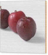 Three Red Plums, White Background Wood Print