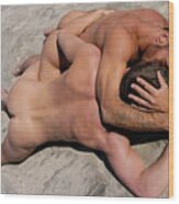 Two Nude Men In Homoerotic Kiss On The Sand At The Beach. Wood Print