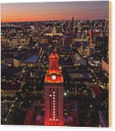 University Of Texas Tower Lit With No. 1 Shines Bright Orange Over The Austin Skyline And Capitol Wood Print