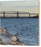 Waves Lapping The Shore Of The Delaware River Near Betsy Ross And Delair Memorial Railroad Bridges Wood Print