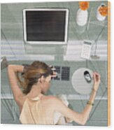 Woman Leaning Head On Desk With Futuristic Devices, High Angle View Wood Print