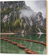 Wooden Boats On The Peaceful  Lake. Lago Di Braies, Italy Wood Print