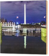 World War Ii Memorial With The Washington Monument In The Background Wood Print