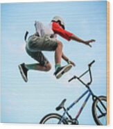 Young Boy Is Jumping With Bmx Wood Print