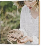 Young Girl Learning And Playing With An Earthworms In Her Kitchen Garden. Wood Print